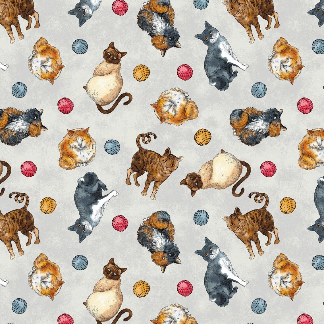 Tela de algodón azul claro con estampado de diferentes razas de gatos y pequeños ovillos de lana de colores de la colección Cat Rescue.
