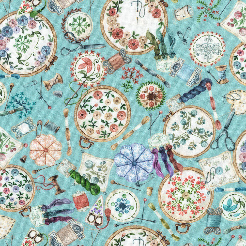 Tela de patchwork turquesa con estampado vintage de bastidores de bordado y hilos de la colección Make it Sew de Robert Kaufman.