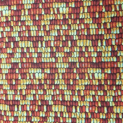 Tela de algodón tipo patchwork con dibujos que parecen granos de maiz