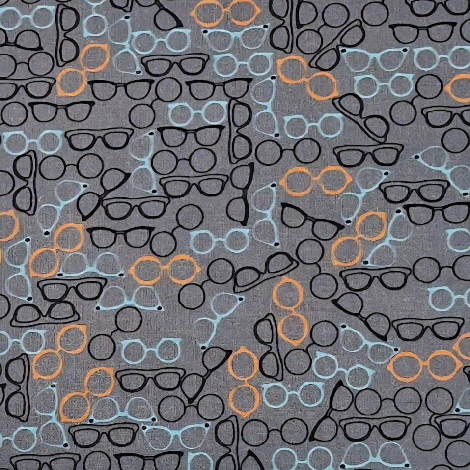 Tela de algodón Stof Fabrics, colección Best Bits. Estampado de gafas retro de 2 cm en colores negro, azul y naranja sobre un fondo gris con textura.