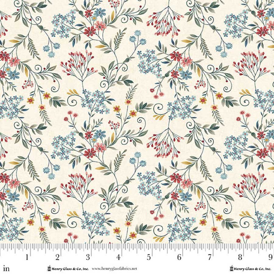 Tela de algodón con fondo crudo y estampado floral en tonos rojo, azul, amarillo y verde, con flores pequeñas y hojas finas