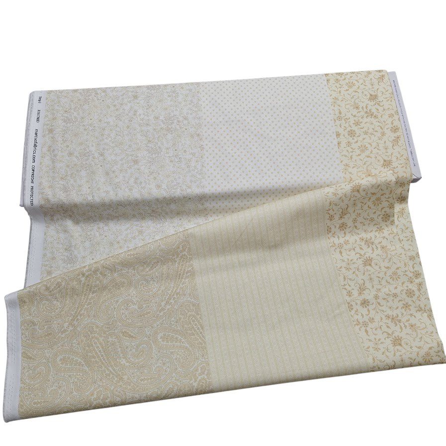 Tela de algodón en tonos beige con estampados combinados de flores, lunares, cachemir y rayas en estilo patchwork