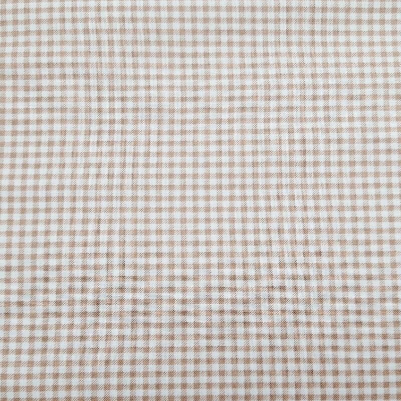 Tela de algodón tipo patchwork, de la colección Nest de cuadritos vichy en color caramelo sobre fondo crema