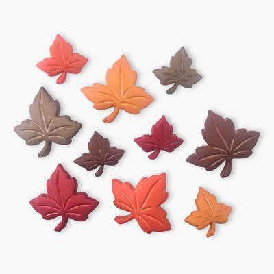 Botones decorativos en forma de hojas y tonos tierra, en distintos tamaños